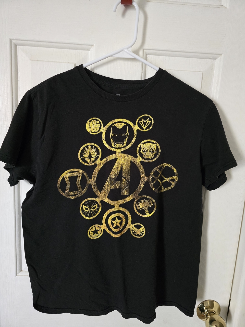 Marvel Black Tee with Distressed Gold Avengers Emblem